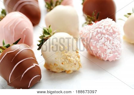 Strawberries Covered In Chocolate On A White Pergament