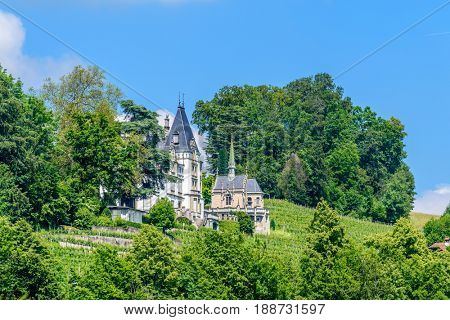 Waterview on Swiss village, house or castle near Lucerne, Switzerland.