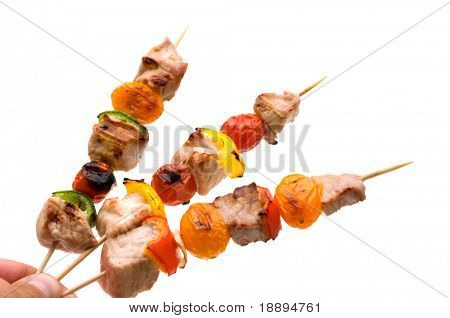 kebab di maiale alla griglia nella mano