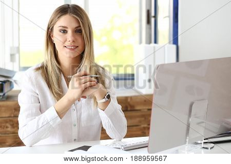 Beautiful Smiling Businesswoman Portrait At Workplace