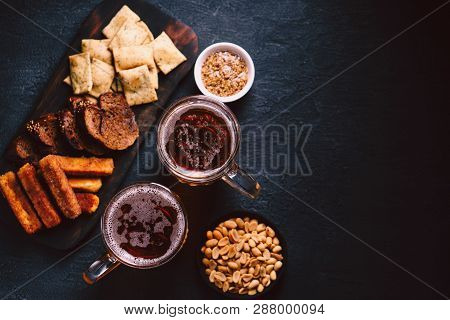 Beer And Snacks. Bar Table. Restaurant, Pub, Food Concept. Delicious Lager Drink And Appetizers Set-