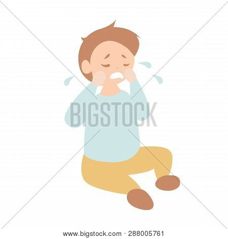 Cute Toddler Boy Crying On The Floor. Terrible Twos.  Children Emotions Development Concept.