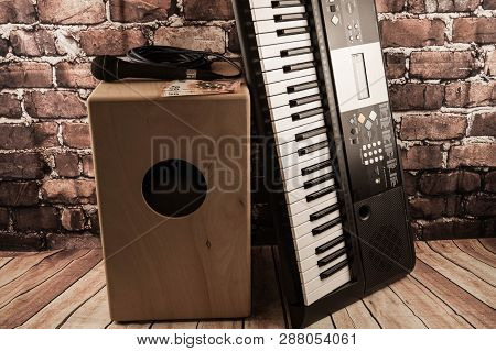 Music Equipment Like Cajon Synthesizer And Microphone