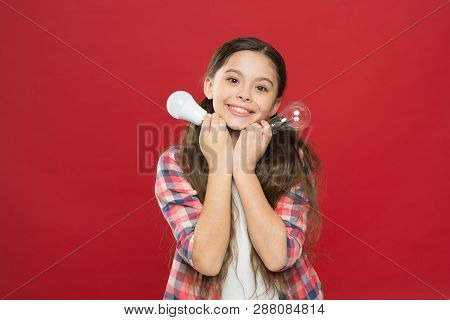 Girl Adorable Child With Long Hair Hold Light Bulbs. Idea And Creativity. Fresh Idea Of Youth Genera