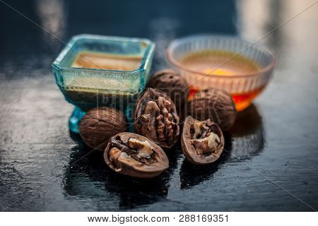 Close Up Of Best Home Remedy To Treat Anemia In A Glass Bowl On Wooden Surface Consisting Of Walnut
