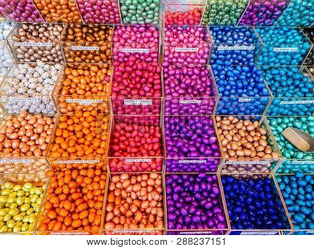 Multicolor Store Front Or Supermarket With Chocolate Eggs In Colorful Foil For Easter