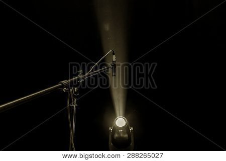 Stage Lights. Several Projectors In The Dark. Multi-colored Light Beams From The Stage Spotlights On