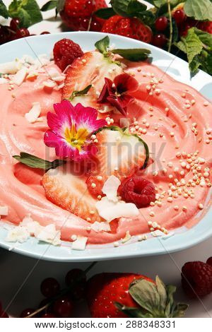 Healthy Homemade Raw Vegan Banana And Berry Ice Cream (icecream, Nicecream) Topped With Organic Stra