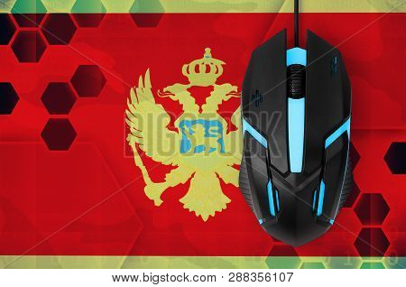 Montenegro Flag  And Computer Mouse. Concept Of Country Representing E-sports Team