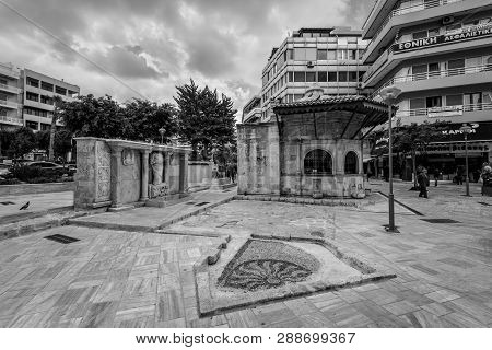 Heraklion, Crete, Greece - November 2, 2019: Ancient Venetian Bembo Fountain In Kornarou Square, Her