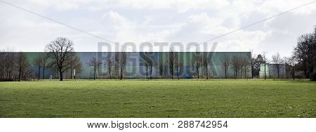 Colorful Building In Meadow Landscape Near Scherpenzeel In Dutch Province Of Utrecht In The Netherla