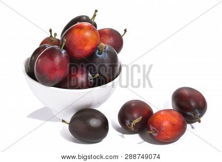 Fresh Juicy Plum On A White Background