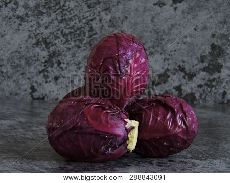 Blue Cabbage With Water Drops. Background Of Blue Cabbage. Blue Cabbage Heap.