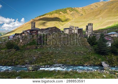 Rural Georgian Ladscape With Stone Svan Towers In Ushguli Community