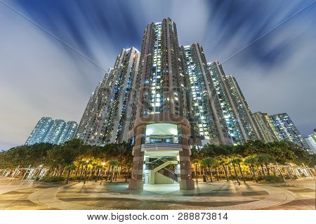 Residential Buildings In Hong Kong City At Night