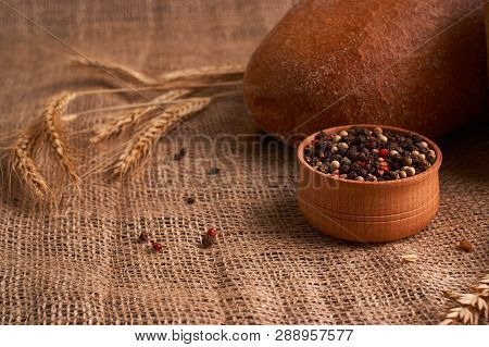 Bowl Of Various Pepper Peppercorns Seeds Mix On Table Rastic Style Background