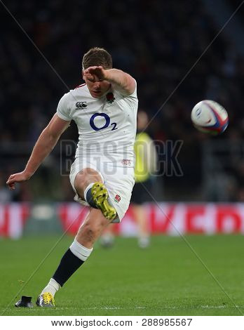 LONDON, ENGLAND - MARCH 09 2019: Owen Farrell of England kicks a conversion during the Guinness Six Nations match between England and Italy at Twickenham Stadium