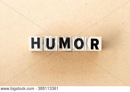 Letter Block In Word Humor On Wood Background