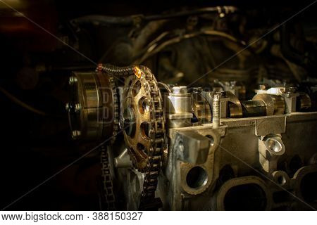 Car Engine Insides Chains With Main Engine In Open Close Up View (concept Idea Or Genius) In Automob