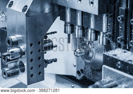 The Operation Of Multi-tasking Cnc Lathe Machine Swiss Type Making The Pipe Connector Parts. The Hi-