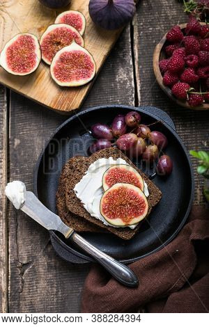 Tasty Tapas, Snack Or Crostini Or Bruschetta With Toasted Bread, Cheese, Figs. Delicious Breakfast, 