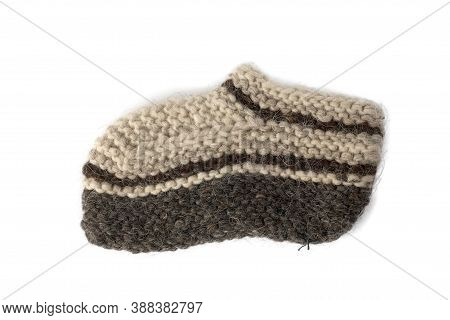 Warm Knitted Socks From Sheepskin Wool Isolated On White Background. Large Knitting, Handmade, Tied