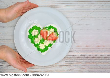Green Meringue Cake With Strawberries. French Dessert With Whipped Cream. Delicious Cake Covered Wit