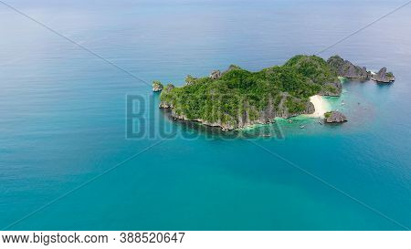 Tropical Beach With Tourists Surrounded By Blue Water, Aerial View. Lahos Island, Caramoan Islands, 