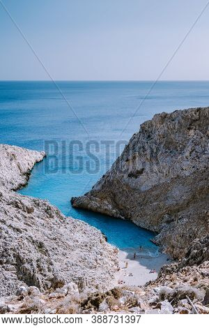 Crete Greece Seitan Limania Beach With Huge Cliff By The Blue Ocean Of The Island Of Crete In Greece