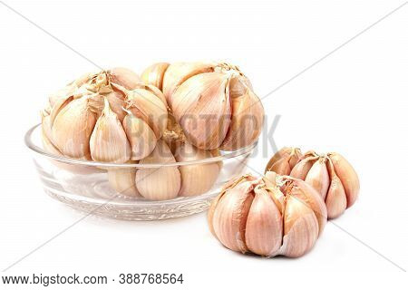 Garlic Cloves And Bulb In Glass Bowl Isolated On White Backgroound. Fresh Gralic Cloves. Pile Of Gar