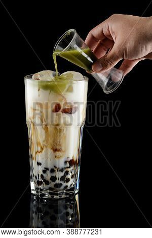 Pouring Green Matcha Into Glass With Milk Bubble Tea At Black, Milk Tea With Matcha And Tapioca, Mat