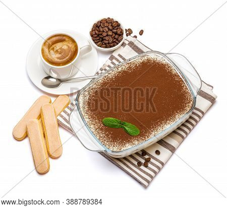 Traditional Italian Tiramisu Dessert In Glass Baking Dish, Savoiardi Cookies And Cup Of Fresh Espres