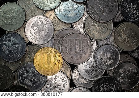 Coin 10 Rubles Lies Between Other Rubles In A Box