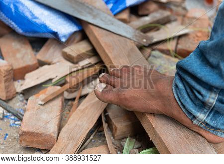 An Image Of A Man's Foot That Stepped On Various Wood Chips