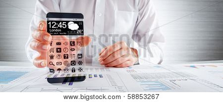 Smartphone (phablet) with a transparent display in human hands. Concept actual future innovative ideas and best technologies humanity.
