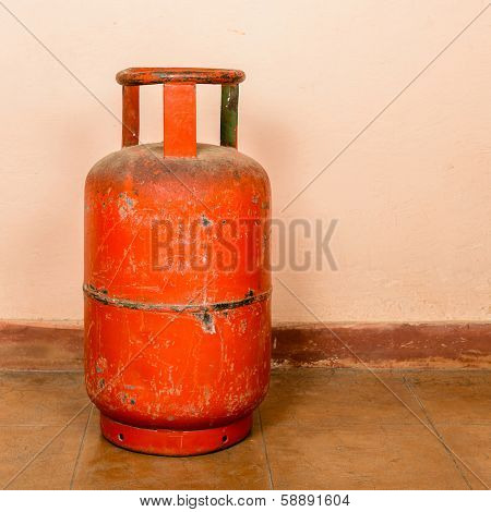 Red gas cylinder on pink cylinder