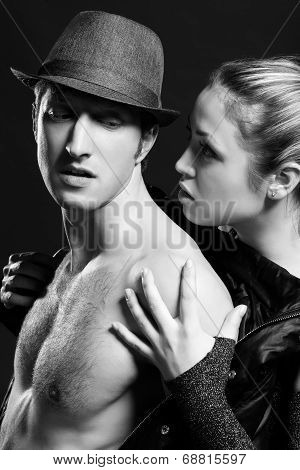lowkey B and W portrait of a passionate couple