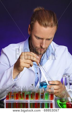 Crazy scientist working in laboratory