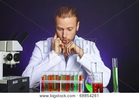 Crazy scientist working in laboratory