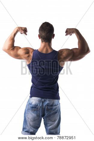 Attractive Muscular Man Striking A Pose, Showing Back And Biceps