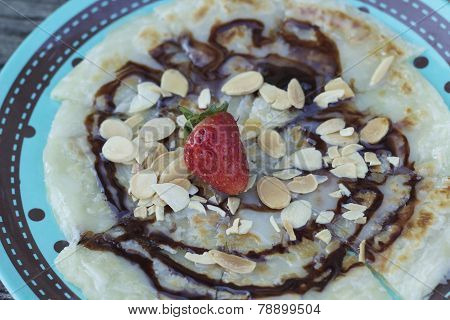 Indian Chapati Breads Or Roti Dough And Strawberry Fruit.
