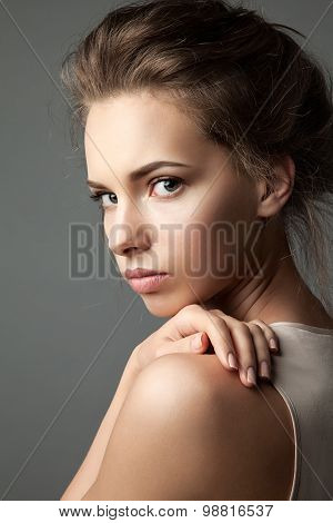 Close-up portrait of a blonde young pretty woman with natural make-up