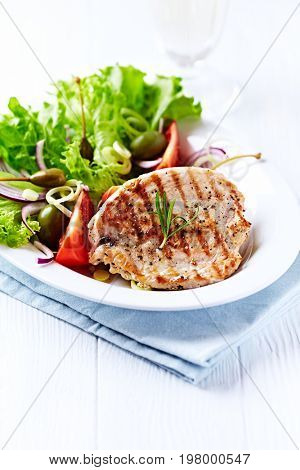 Grilled turkey breast fillet with fresh salad