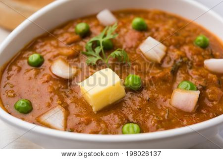 Pav bhaji or pavbhaji - popular Indian street food, selective focus
