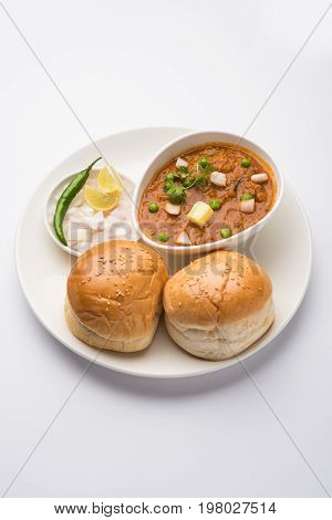 Pav bhaji or pavbhaji - popular Indian street food, selective focus