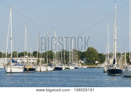 Wickford Rhode Island USA - September 3 2007: Lines of sailboats lining waterfront in Wickford Cove