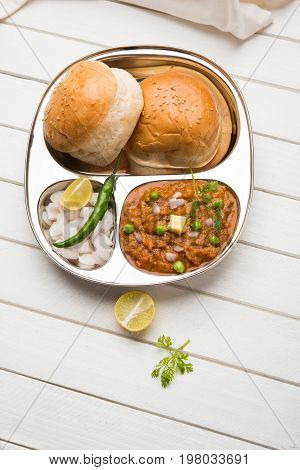 Pav bhaji or pavbhaji - popular Indian street food, selective focus