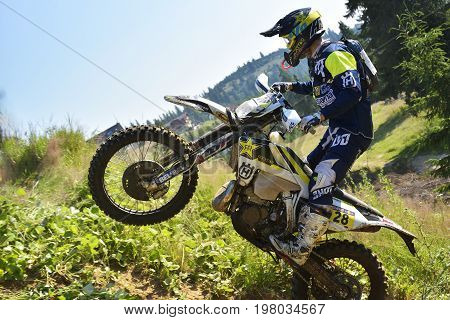 Sibiu, Romania - July 12 - 16 July: Copetitors In Red Bull Romaniacs Hard Enduro Rally With A Ktm Mo
