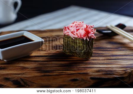 Delicious Fresh Nigiri With Spicy Crab Meat And Caviar Served On