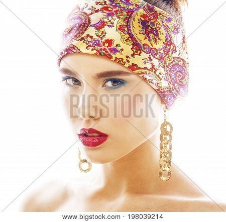 young pretty modern girl with bright shawl on head emotional posing isolated on white background, asian people ethnicity